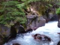 Swift mountain creek carving out rocks
