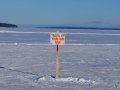 "Travel at your own risk" sign