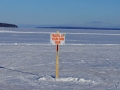 "Travel at your own risk" sign